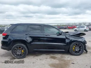 2020 Jeep Grand Cherokee Overland with VIN 1C4RJFCG8LC431009, listed as a IAAI auction lot 41915189 with 58,669 mi miles and . Bid and sale history available at DreamBid. Image 14.