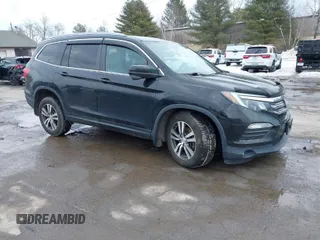 2016 Honda Pilot EX with VIN 5FNYF6H3XGB001140, listed as a IAAI auction lot 41665747 with 123,830 mi miles. Bid and sale history available at carsss.com. Image 1.