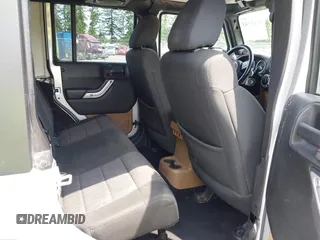 2012 Jeep Wrangler Unlimited Altitude with VIN 1C4HJWEG2CL140059, listed as a IAAI auction lot 42433563 with 189,868 mi miles and . Bid and sale history available at DreamBid. Image 8.