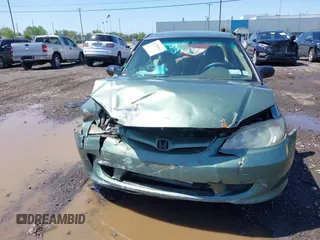 2004 Honda Civic LX z VIN 2HGES15554H591164, wystawiony jako IAAI lot #42289863 z przebiegiem 200 500 mil mil oraz . Historia ofert i sprzedaży dostępna na DreamBid. Obrazek 12.