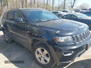 2017 Jeep Grand Cherokee Laredo with VIN 1C4RJFAG5HC793244, listed as a IAAI auction lot 41904575 with 299,722 mi miles. Bid and sale history available at carsss.com. Image 1.