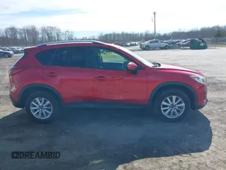 2016 Mazda CX-5 Touring with VIN JM3KE4CY5G0816285, listed as a IAAI auction lot 41888537 with 101,598 mi miles. Bid and sale history available at carsss.com. Image 13.