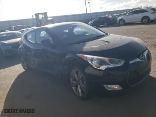 2014 Hyundai Veloster with VIN KMHTC6AD7EU191601, listed as a Copart auction lot 44791295 with 80,501 mi miles and Salvage Title. Bid and sale history available at carsss.com. Image 4.