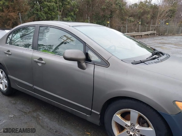 2007 Honda Civic Sdn EX with VIN 1HGFA16847L022071, listed as a IAAI auction lot 41534052 with 192,090 mi miles. Bid and sale history available at carsss.com. Image 13.