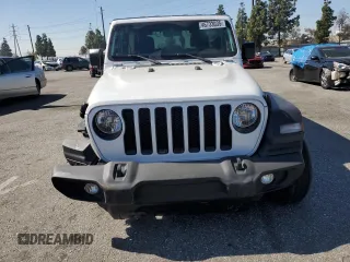 2023 Jeep Wrangler Sport Altitude with VIN 1C4HJXDG3PW623930, listed as a Copart auction lot 46733035 with 26,032 mi miles and Salvage Title. Bid and sale history available at DreamBid. Image 5.