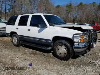 1997 GMC Yukon with VIN 1GKEK13R0VJ747359, listed as a Copart auction lot 48301095 with 272,417 mi miles and Salvage Title. Bid and sale history available at carsss.com. Image 4.