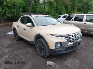 2022 Hyundai Santa Cruz SEL z VIN 5NTJCDAE4NH009213, wystawiony jako IAAI lot #42318070 z przebiegiem 36 491 mil mil oraz . Historia ofert i sprzedaży dostępna na DreamBid. Obrazek 1.