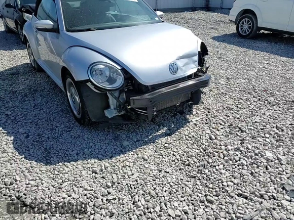 2015 Volkswagen Beetle 1.8T with VIN 3VW517AT8FM810709, listed as a Copart auction lot 48065314 with 61,924 mi miles and Salvage title. Bid and sale history available at DreamBid. Image 12.