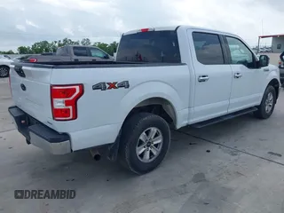 2018 Ford F-150 XL with VIN 1FTEW1EP0JFC32841, listed as a IAAI auction lot 42105784 with 119,764 mi miles. Bid and sale history available at carsss.com. Image 4.
