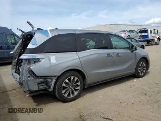 2021 Honda Odyssey EX-L with VIN 5FNRL6H74MB010119, listed as a Copart auction lot 52353355 with 39,366 mi miles and Salvage Title. Bid and sale history available at DreamBid. Image 3.