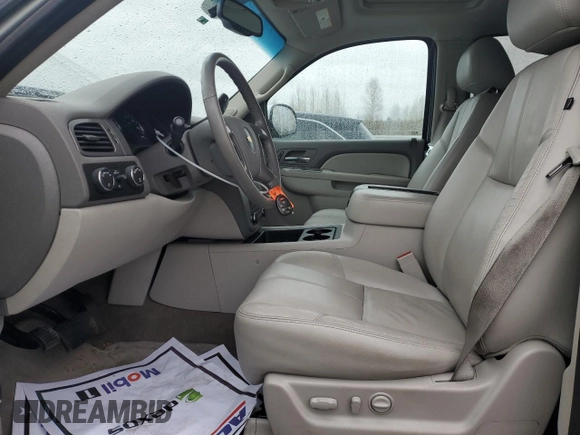 2012 Chevrolet Suburban LT with VIN 1GNSKJE74CR189340, listed as a Copart auction lot 51044655 with 145,973 mi miles and Salvage Title. Bid and sale history available at carsss.com. Image 7.