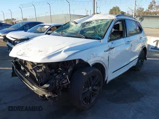 2022 Volkswagen Tiguan SE R-Line Black with VIN 3VVCB7AX1NM022655, listed as a IAAI auction lot 41319977 with 92,860 mi miles and . Bid and sale history available at DreamBid. Image 18.