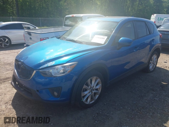 2013 Mazda CX-5 Grand Touring with VIN JM3KE2DEXD0123314, listed as a IAAI auction lot 42064266 with 288,935 mi miles. Bid and sale history available at carsss.com. Image 19.