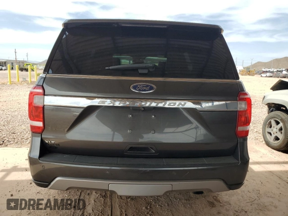 2018 Ford Expedition XLT with VIN 1FMJU1HT8JEA13947, listed as a Copart auction lot 58583495 with 98,706 mi miles and Salvage title. Bid and sale history available at DreamBid. Image 6.