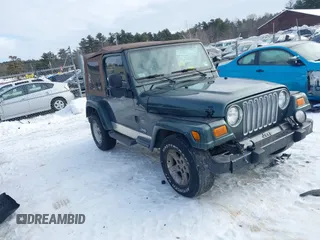 2004 Jeep Wrangler Sahara with VIN 1J4FA59S74P736918, listed as a IAAI auction lot 41632100 with 146,622 mi miles. Bid and sale history available at carsss.com. Image 1.