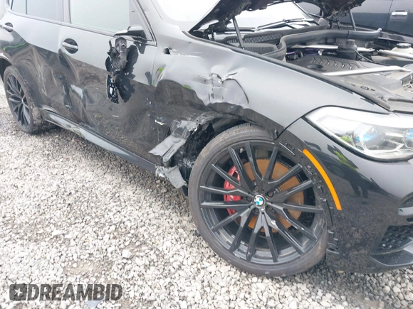 2022 BMW X5 xDrive40i with VIN 5UXCR6C05N9N12775, listed as a IAAI auction lot 42011660 with 92,790 mi miles and . Bid and sale history available at DreamBid. Image 6.
