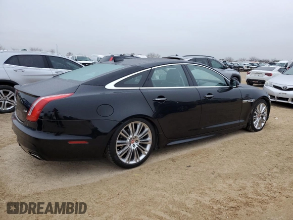 2017 Jaguar XJ R-Sport with VIN SAJWA1C77H8W04956, listed as a Copart auction lot 45174505 with 142,002 mi miles and Salvage title. Bid and sale history available at DreamBid. Image 3.