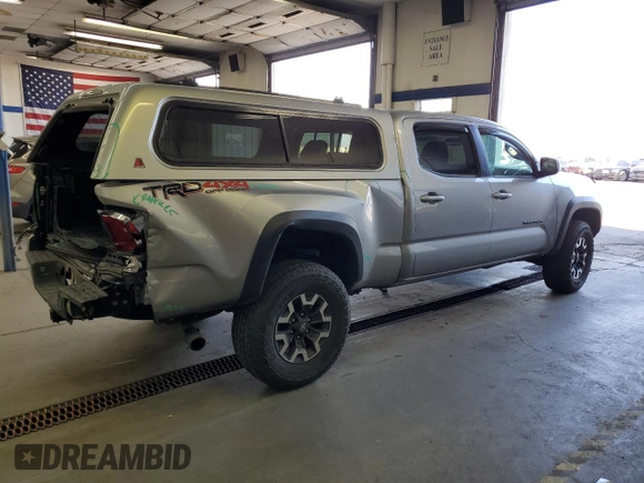 2023 Toyota Tacoma SR5 z VIN 3TMDZ5BNXPM165719, wystawiony jako Copart lot #58256035 z przebiegiem 13 681 mil mil oraz Szkoda całkowita • Salvage title. Historia ofert i sprzedaży dostępna na DreamBid. Obrazek 3.