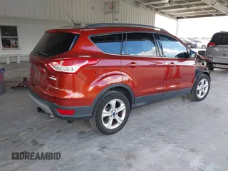 2016 Ford Escape SE with VIN 1FMCU0GX1GUB12017, listed as a IAAI auction lot 40760172 with 174,572 mi miles. Bid and sale history available at carsss.com. Image 4.