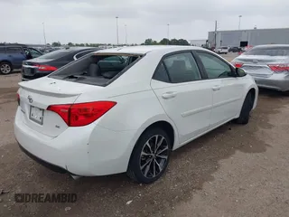 2019 Toyota Corolla L with VIN 5YFBURHE0KP875377, listed as a IAAI auction lot 41904405 with 73,604 mi miles and . Bid and sale history available at DreamBid. Image 4.