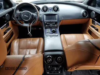 2013 Jaguar XJ Portfolio with VIN SAJWJ2GD0D8V44292, listed as a Copart auction lot 57073775 with 100,458 mi miles and Salvage Title. Bid and sale history available at DreamBid. Image 8.