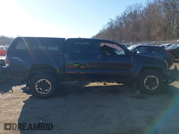 2011 Toyota Tacoma with VIN 3TMLU4EN4BM058738, listed as a IAAI auction lot 41646897 with 117,817 mi miles and . Bid and sale history available at DreamBid. Image 13.