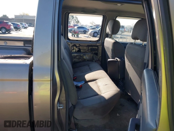 2003 Nissan Frontier XE with VIN 1N6ED29X53C406104, listed as a IAAI auction lot 41001244 with 227,871 mi miles and . Bid and sale history available at DreamBid. Image 8.