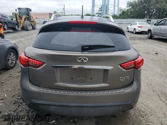 2014 Infiniti QX70 with VIN JN8CS1MW7EM412867, listed as a Copart auction lot 60054195 with 148,064 mi miles and Salvage title. Bid and sale history available at DreamBid. Image 6.