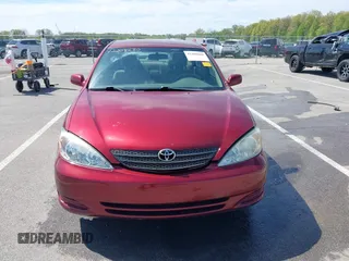 2004 Toyota Camry LE z VIN 4T1BE32K94U310300, wystawiony jako IAAI lot #42208680 z przebiegiem 104 701 mil mil oraz . Historia ofert i sprzedaży dostępna na DreamBid. Obrazek 12.