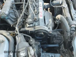 1990 Toyota Corolla z VIN 1NXAE97A0LZ129244, wystawiony jako IAAI lot #42861579 z przebiegiem 329 572 mil mil oraz . Historia ofert i sprzedaży dostępna na DreamBid. Obrazek 12.
