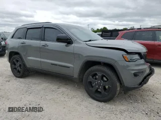 2021 Jeep Grand Cherokee Freedom with VIN 1C4RJFAG4MC770600, listed as a Copart auction lot 60846255 with 56,427 mi miles and Salvage title. Bid and sale history available at DreamBid. Image 4.