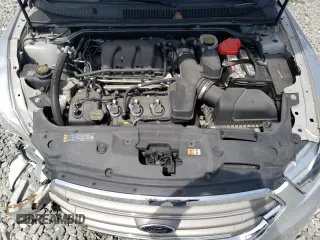 2018 Ford Taurus SEL with VIN 1FAHP2E87JG137928, listed as a Copart auction lot 53438695 with 56,874 mi miles and Salvage title. Bid and sale history available at DreamBid. Image 11.