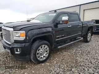 2017 GMC Sierra 2500HD Denali z VIN 1GT12UEG2HF166363, wystawiony jako Copart lot #80565834 z przebiegiem 95 239 mil mil oraz Czysty tytuł • Clean title. Historia ofert i sprzedaży dostępna na DreamBid. Obrazek 1.