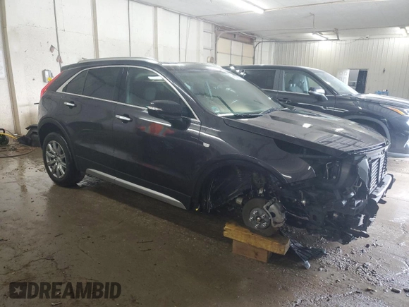 2023 Cadillac XT4 AWD Premium Luxury z VIN 1GYFZDR43PF174188, wystawiony jako Copart lot #59106355 z przebiegiem 27 530 mil mil oraz Szkoda całkowita • Salvage title. Historia ofert i sprzedaży dostępna na DreamBid. Obrazek 4.