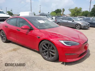 2022 Tesla Model S with VIN 5YJSA1E58NF486727, listed as a IAAI auction lot 42139418 with Not provided miles and . Bid and sale history available at DreamBid. Image 1.
