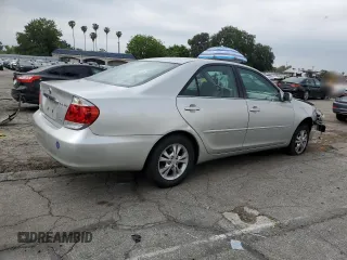 2005 Toyota Camry LE with VIN 4T1BF32KX5U601192, listed as a Copart auction lot 55365485 with 153,251 mi miles and Salvage Title. Bid and sale history available at DreamBid. Image 3.