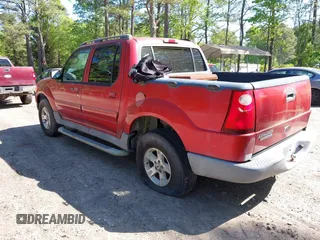 2005 Ford Explorer Sport Trac XLS z VIN 1FMZU77K95UB13467, wystawiony jako IAAI lot #42142049 z przebiegiem 164 156 mil mil oraz . Historia ofert i sprzedaży dostępna na DreamBid. Obrazek 3.