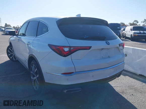 2022 Acura MDX w/Technology Package with VIN 5J8YD9H48NL000743, listed as a IAAI auction lot 41817644 with 69,800 mi miles. Bid and sale history available at carsss.com. Image 3.