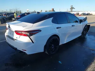 2023 Toyota Camry SE with VIN 4T1T11AK7PU835799, listed as a IAAI auction lot 41806697 with 30,609 mi miles. Bid and sale history available at carsss.com. Image 4.