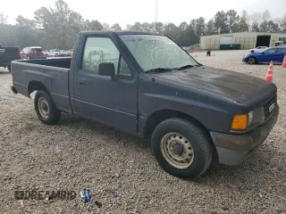 1993 Isuzu Pickup S z VIN 4S1CL11L2P4207469, wystawiony jako Copart lot #79279374 z przebiegiem 144 885 mil mil oraz Tytuł czysty. Historia ofert i sprzedaży dostępna na DreamBid. Obrazek 4.