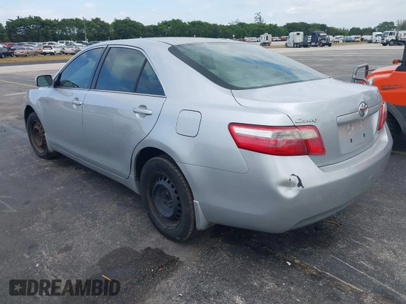 2007 Toyota Camry CE with VIN 4T1BE46K97U621990, listed as a IAAI auction lot 41907054 with 136,067 mi miles. Bid and sale history available at carsss.com. Image 3.