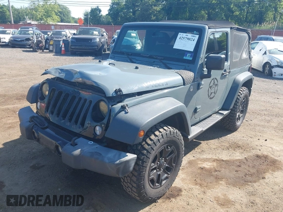 2015 Jeep Wrangler Freedom Edition with VIN 1C4AJWAG1FL714002, listed as a IAAI auction lot 42579024 with 98,732 mi miles and . Bid and sale history available at DreamBid. Image 6.