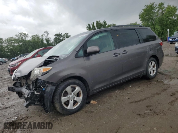 2015 Toyota Sienna LE AAS with VIN 5TDKK3DC3FS572405, listed as a Copart auction lot 58141975 with 146,820 mi miles and Salvage title. Bid and sale history available at DreamBid. Image 1.