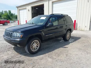 2002 Jeep Grand Cherokee Limited with VIN 1J8GX58N32C130002, listed as a IAAI auction lot 42179840 with 246,661 mi miles and . Bid and sale history available at DreamBid. Image 2.