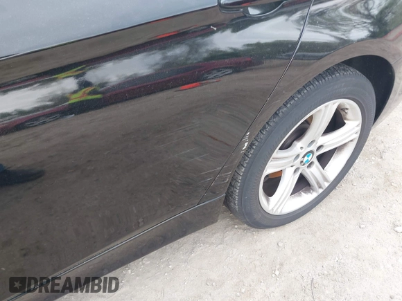 2014 BMW 3 Series 320i xDrive with VIN WBA3C3G5XENS68374, listed as a IAAI auction lot 42042243 with 107,830 mi miles. Bid and sale history available at carsss.com. Image 6.