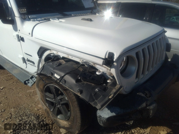 2018 Jeep Wrangler Unlimited Sahara z VIN 1C4HJXEG0JW207873, wystawiony jako IAAI lot #41213655 z przebiegiem 61 043 mil mil oraz . Historia ofert i sprzedaży dostępna na DreamBid. Obrazek 6.