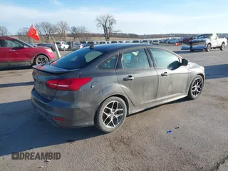 2016 Ford Focus SE with VIN 1FADP3F27GL374188, listed as a IAAI auction lot 41738121 with 125,229 mi miles. Bid and sale history available at carsss.com. Image 4.