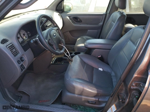 2002 Ford Escape Limited with VIN 1FMCU04122KD65674, listed as a Copart auction lot 56336504 with 199,739 mi miles and Salvage Title. Bid and sale history available at carsss.com. Image 7.