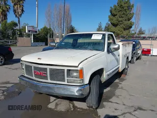 1989 GMC Sierra 1500 with VIN 1GTGC24K2KE504519, listed as a IAAI auction lot 41739839 with 306,714 mi miles and . Bid and sale history available at DreamBid. Image 6.