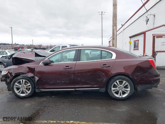 2009 Lincoln MKS with VIN 1LNHM94R59G624848, listed as a IAAI auction lot 38859698 with 129,520 mi miles. Bid and sale history available at carsss.com. Image 14.